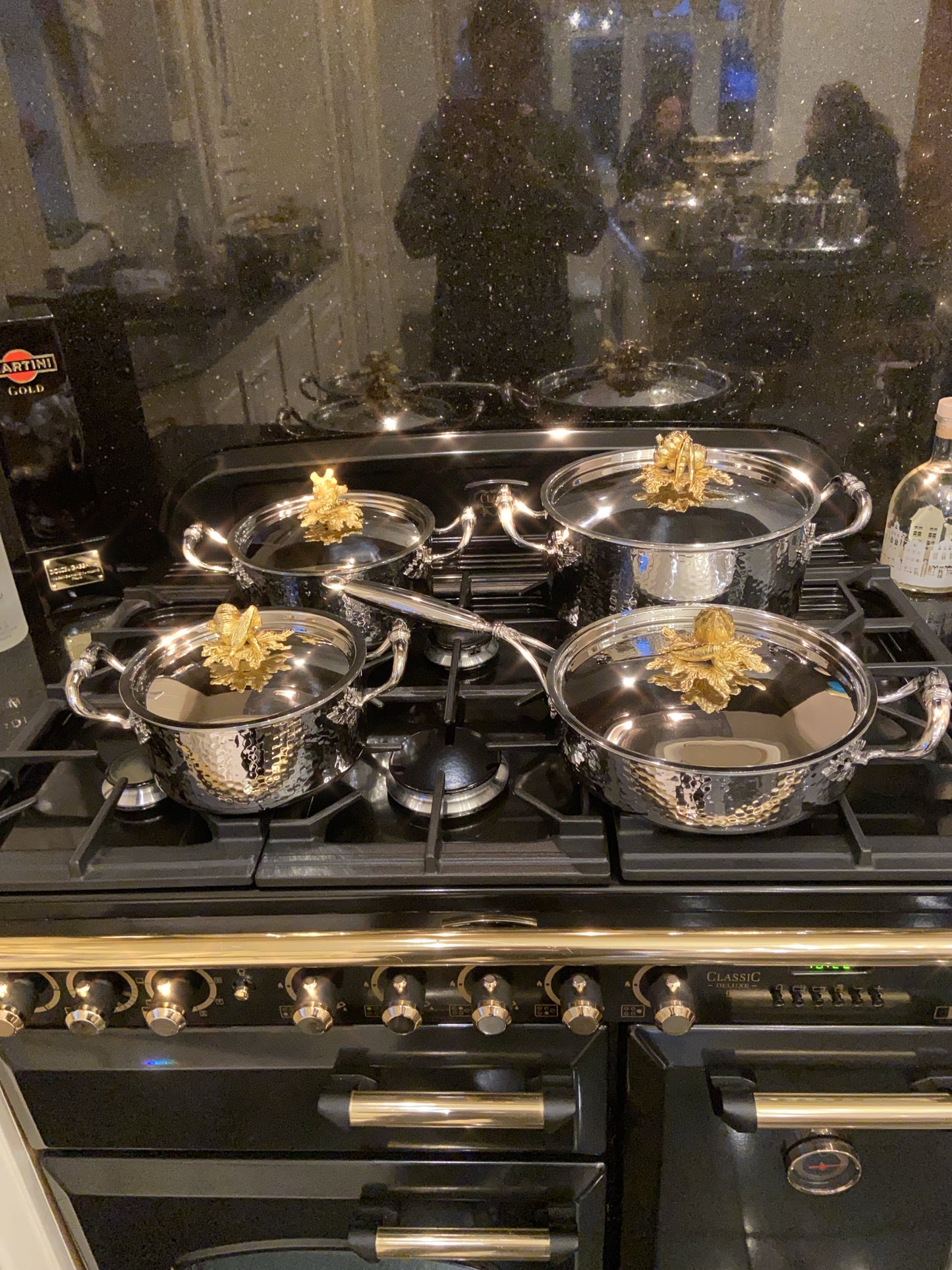 Set di quattro pentole (ghiande dorate)