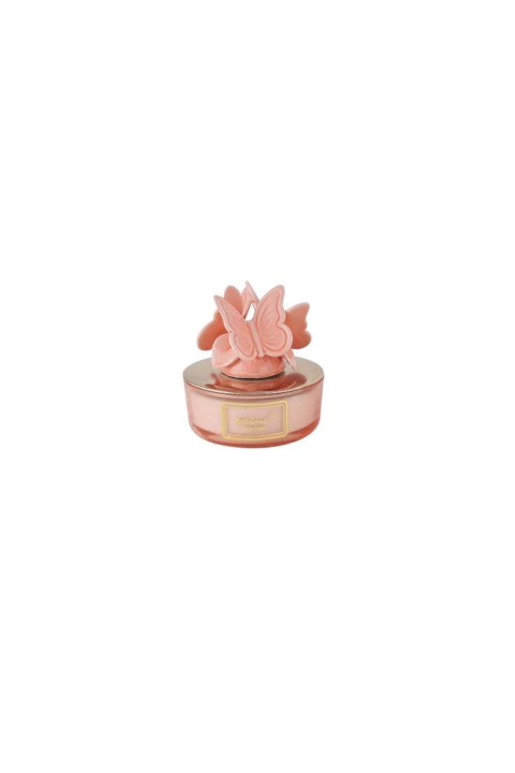 Peach butterfly candle