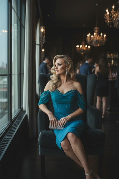 Blauwgroene kokerjurk op knielengte